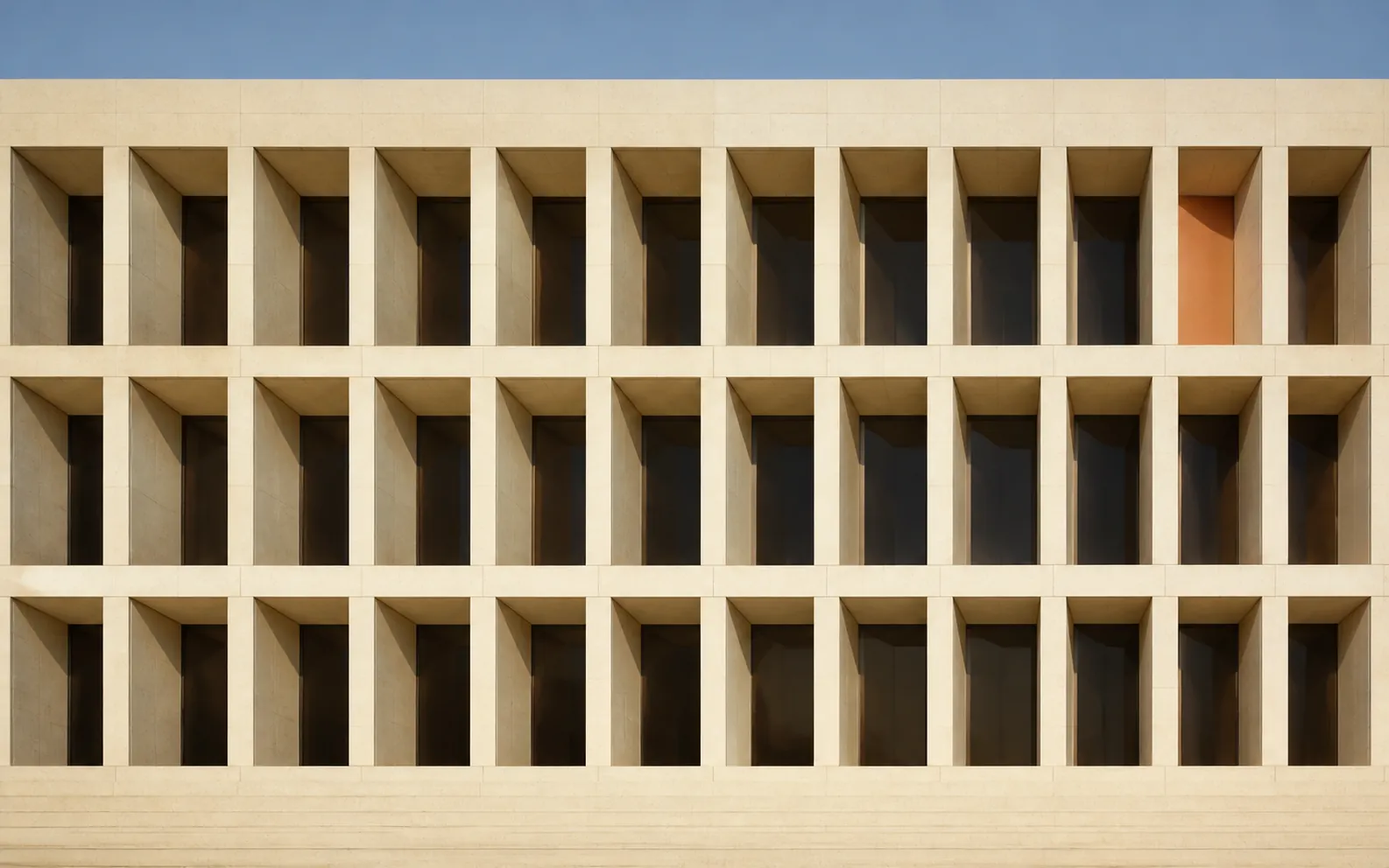 Ordered limestone institutional facade